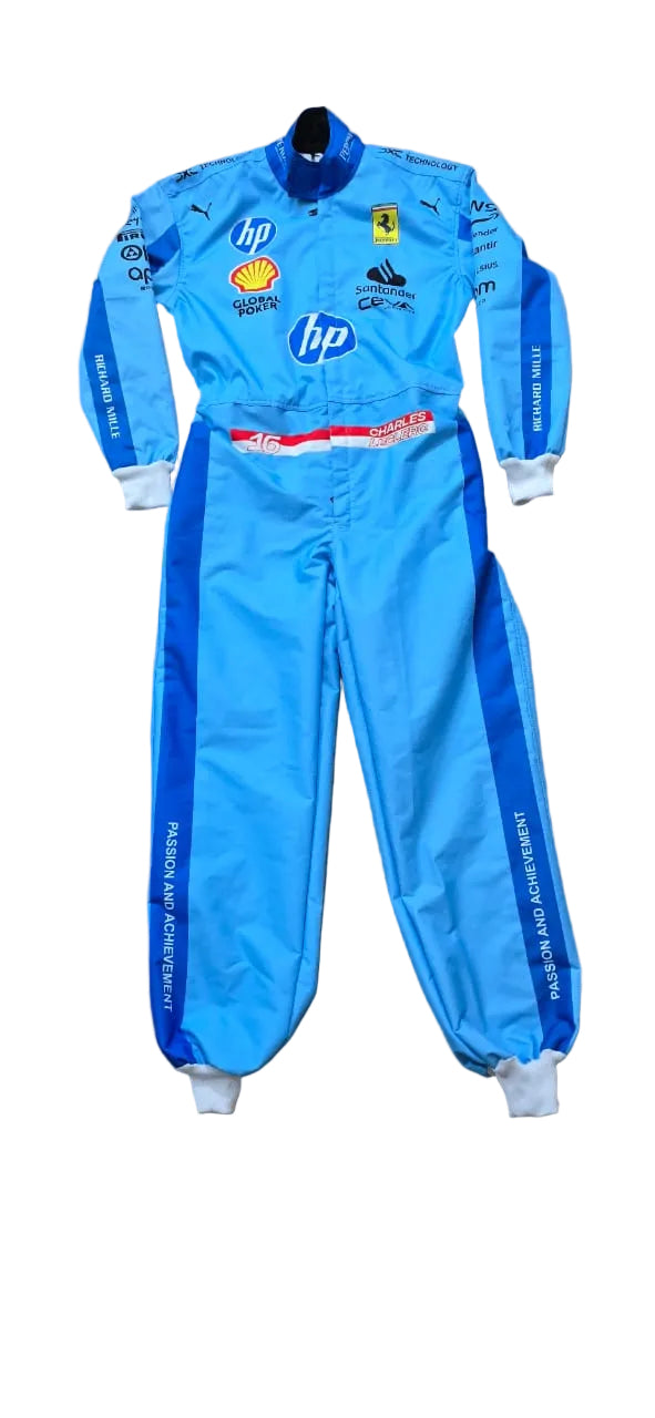 A light blue racing suit with various sponsor logos including HP, Shell, and Ferrari, laid flat on a beige tiled floor.